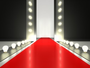 7565055-empty-red-carpet-fashion-runway-illuminated